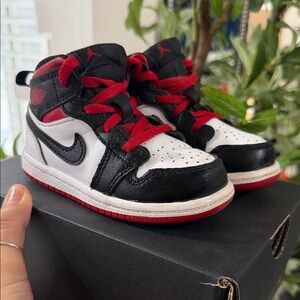 Nike Kids Black, White, and Red Sneakers